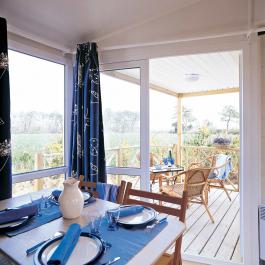 Bright dining area with terrace access