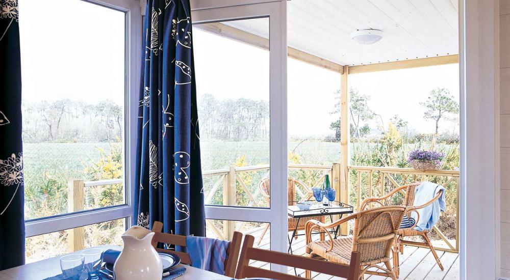 Bright dining area with terrace access